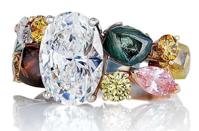 De Beers ring with rough and polished diamonds