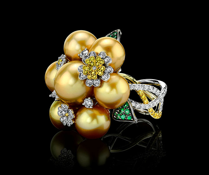 Ring with golden South Sea golden pearls, fancy yellow and white brilliant-cut diamonds, and green garnets in 18k white gold, $5,000; Ring with golden South Sea golden pearls, fancy yellow and white brilliant-cut diamonds, and green garnets in 18k white gold, $5,000;