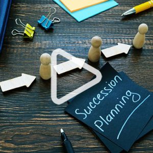 succession planning written on napkin on desk