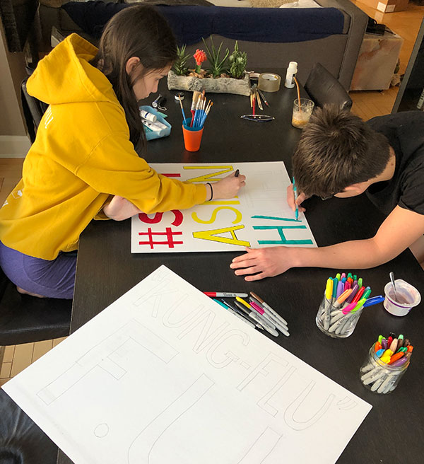 Coco Cael making signs for rally Coco Cael making signs for rally