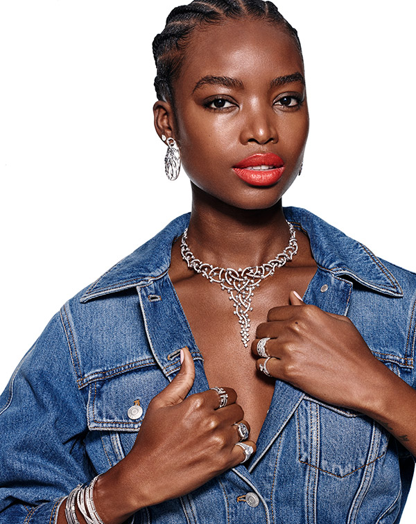 Model in denim with major diamond necklace