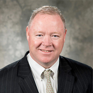 Gregory J Smith