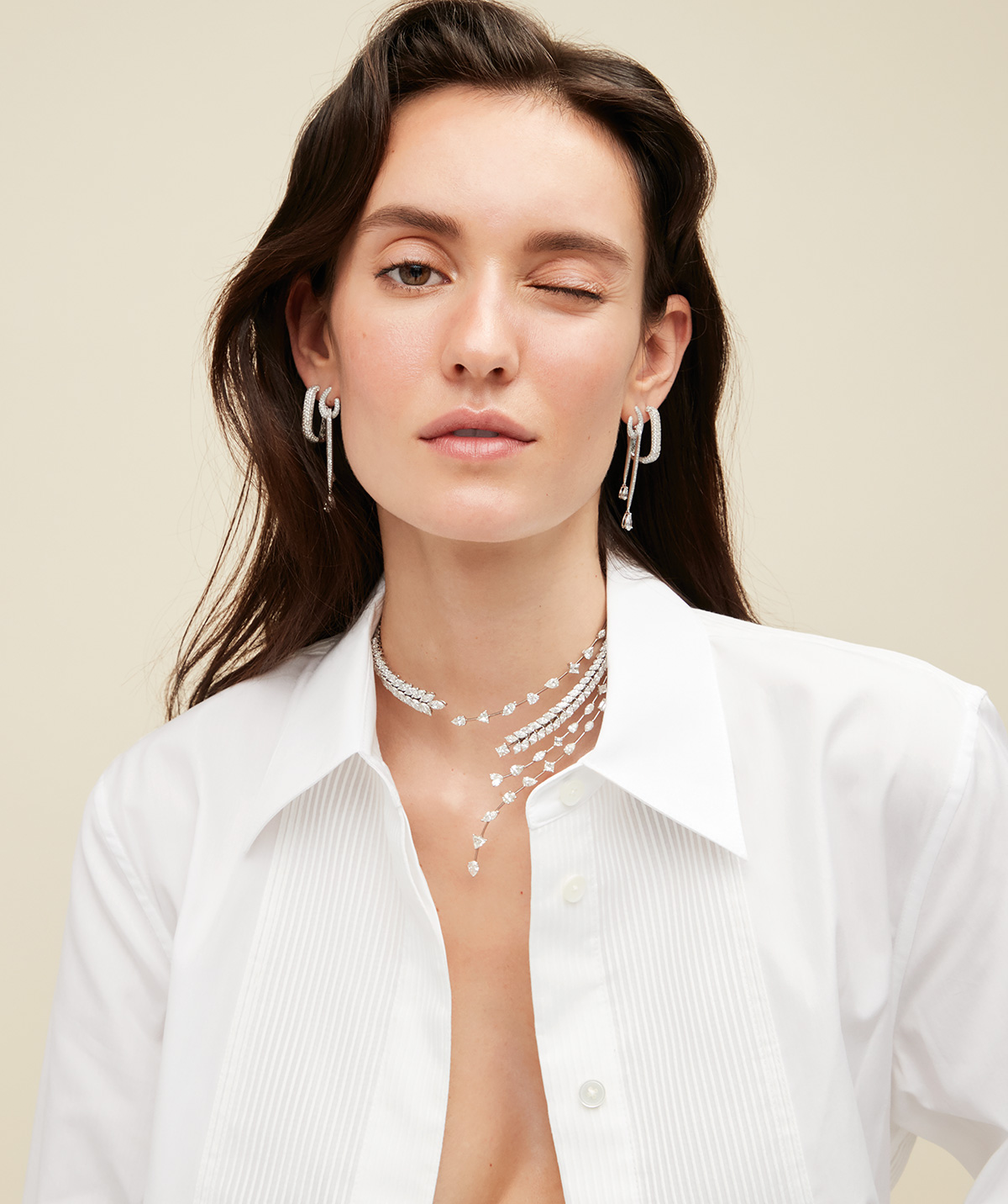 Mei Tao model with open tuxedo shirt and diamonds