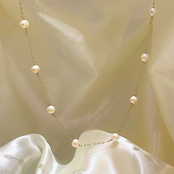 Zacharys Tin Cup necklace Zacharys Tin Cup necklace
