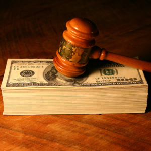 Tariff refunds for importers: gavel on top of a stack of money to signify the court ruling on tariffs